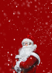 Cool Santa Claus is in sunglasses with arms crossed in the snow. Poster.