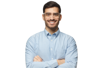 Handsome smiling businessman in blue shirt standing with arms crossed