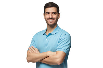 Smiling handsome young man in blue polo shirt standing with crossed arms