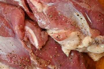 Texture of fatty fresh duck breast close up as background, texture of black meat of duck breast close up photo from above 