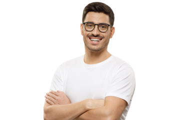 Young laughing handsome man in white t-shirt and glasses, standing with crossed arms