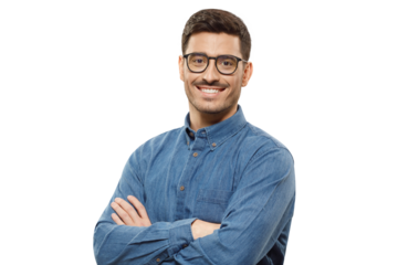 Young businessman wearing casual denim blue shirt and glasses, looking at camera with positive confident smile, holding arms crossed