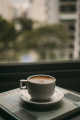 Coffee on a cloudy day near the window