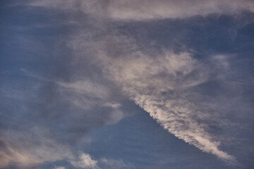White clouds on blue sky background in the sunny afternoon