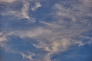 White clouds on blue sky background in the sunny afternoon