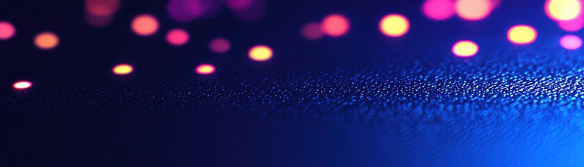 A vivid close-up of a textured surface with colorful bokeh lights, creating an enchanting and dreamy atmosphere for backgrounds.