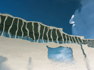 Blue water reflex background of modern biulding. Abstract reflection and abstract inspection...