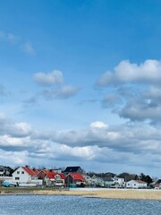 Fototapeta premium A view of red wooden houses on Donso Archipelago island .