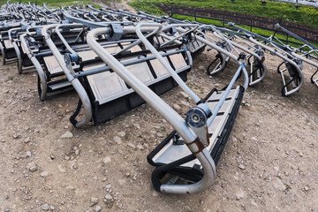 Chairlift undergoing technical inspection after the winter season, patiently awaiting the arrival...