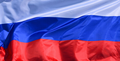 The flag of Russia flutters in the wind