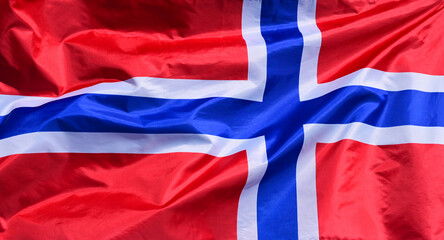 The flag of Norway flutters in the wind