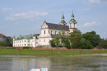 The photo of the Skalka Catholic Church in Kraków captures its baroque architecture standing...