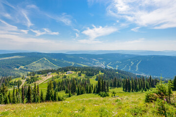 Beautiful landscape of valley in Alpine mountains, small trail, hike root, majestic picturesque view in sunny day
