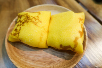 close up of Hong Kong Cantonese style dessert street food - mango pancake with cream filling