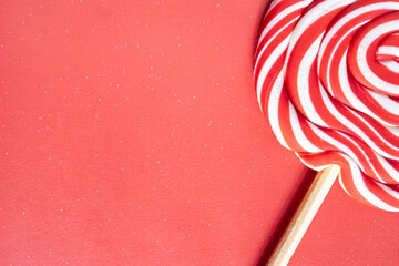 Christmas lollipops on a grey background. Christmas candy. Background for Christmas related things.