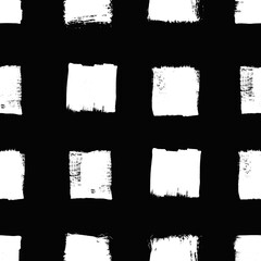 Obraz premium Vector squares pattern. Seamless black and white brush stroke background. Polka dot from squares print with distress texture. Painted ornament for kids. Childish design