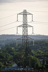 Electrical pole with glass insulators. Distribution transformers. Power transformer. Old power and communication pole.