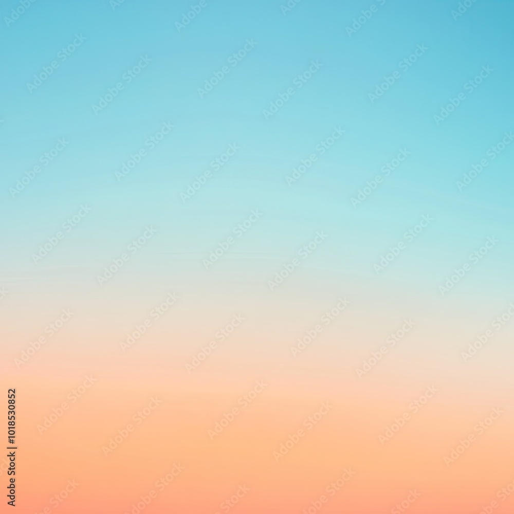 Wall mural a serene gradient of soft blue and warm peach colors, creating a calming and tranquil atmosphere for