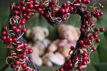 Red heart with two teddy bears on the background for Valentine's Day. 