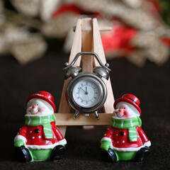 Small clock on the easel counting down to the New Year. Happy New Year.