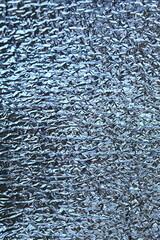 close-up of silver foil texture, macro silver foil as background