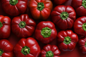 texture of red bell peppers as a background, autumn ripe juicy red bell peppers as a background, juicy organic food