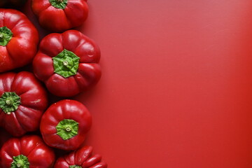 texture of red bell peppers as a background, autumn ripe juicy red bell peppers as a background, juicy organic food
