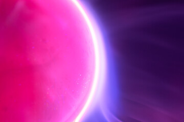 Abstract background with violet electric plasma sphere from plasma lamp. Close up view. Science-fiction or science concept