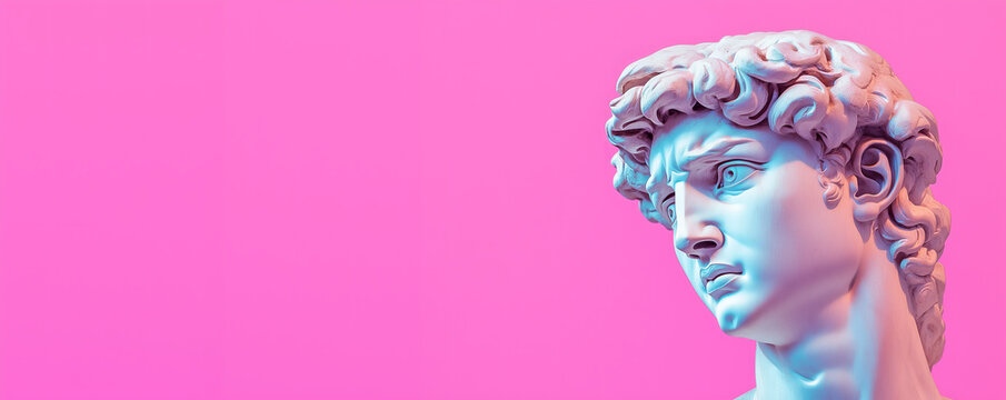 Historical antique ancient statue of David's head against vibrant pink background, creative zine culture theme with copy space.