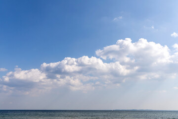 Beautiful white clouds on blue sky over sea