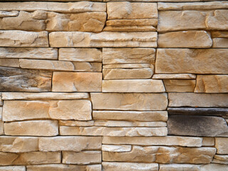 Background of stone wall texture. Stone wall background for design and decoration.