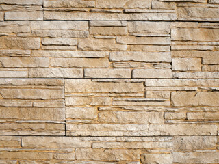 Background of stone wall texture. Stone wall background for design and decoration.