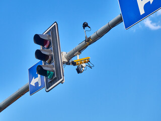 Traffic light with CCTV camera on the street