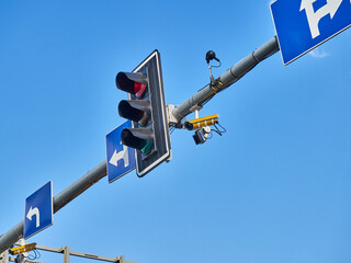 Traffic light with CCTV camera on the street