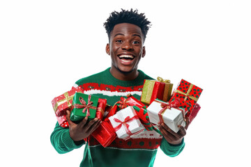 Fototapeta premium Portrait of excited black young man in christmas sweater carrying many gifts , isolated on white studio background