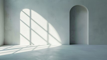 Bright sunlight filters through a window, creating abstract patterns of shadows on the smooth floor and textured wall of a minimalist space with an arched entrance