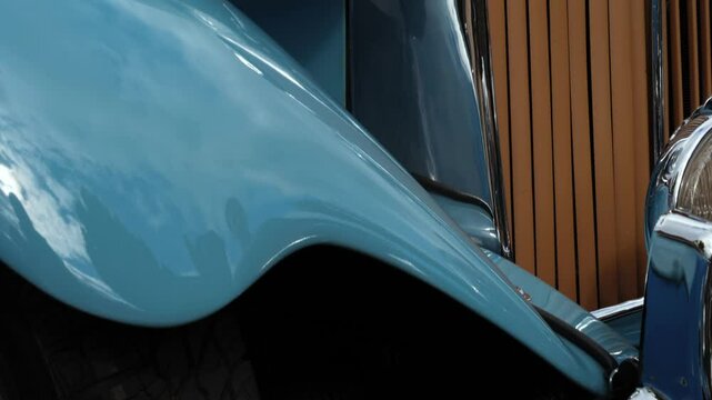 Vintage classic car side view in car headlamps grill 