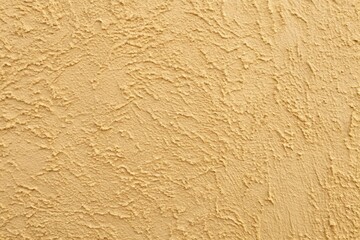 asymmetrical clay structured plaster wall with beige backdrop plate