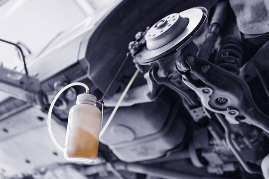 Car service, closeup process changing brake fluid