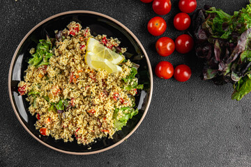 tabbouleh dish bulgur couscous vegetables fresh vegetarian and vegan food gourmet food background on the table rustic food top view copy space