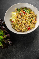 tabbouleh dish bulgur couscous vegetables fresh vegetarian and vegan food gourmet food background...