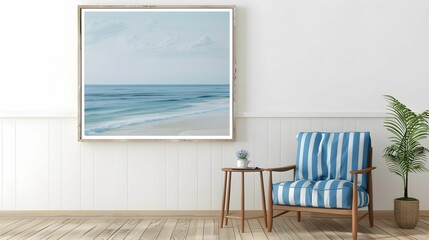 Cozy living space with striped chair and ocean landscape artwork in serene coastal decor