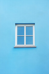 Fototapeta premium White window on color wall background with copy space