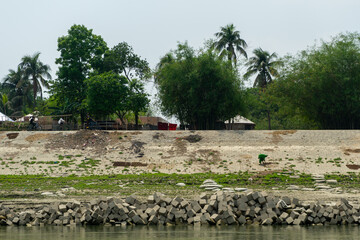 concrete cubes that serve as coastal protection against river erosion. Fortified bank of Ganges (Padma) River in Bangladesh.