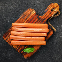 sausages fresh meat pork, beef, chicken dish gourmet food background on the table rustic food top...