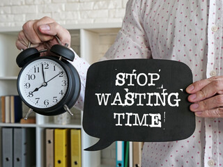 Stop wasting time motivation quote is shown using the text