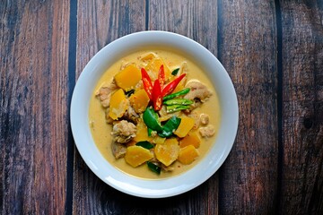 Authentic Thai red chicken curry with pumpkin.