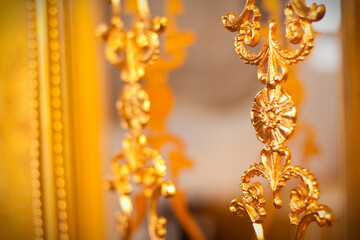 Elegant golden ornamental patterns with intricate designs and luxurious details