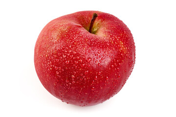 Fresh red apple with water droplets, isolated on white background.