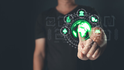 Green Business Innovation and Sustainable Development concept.hand touch hologram to save energy,and reduce global warming,climate change,ecology friendly investment,ESG environment social governance,
